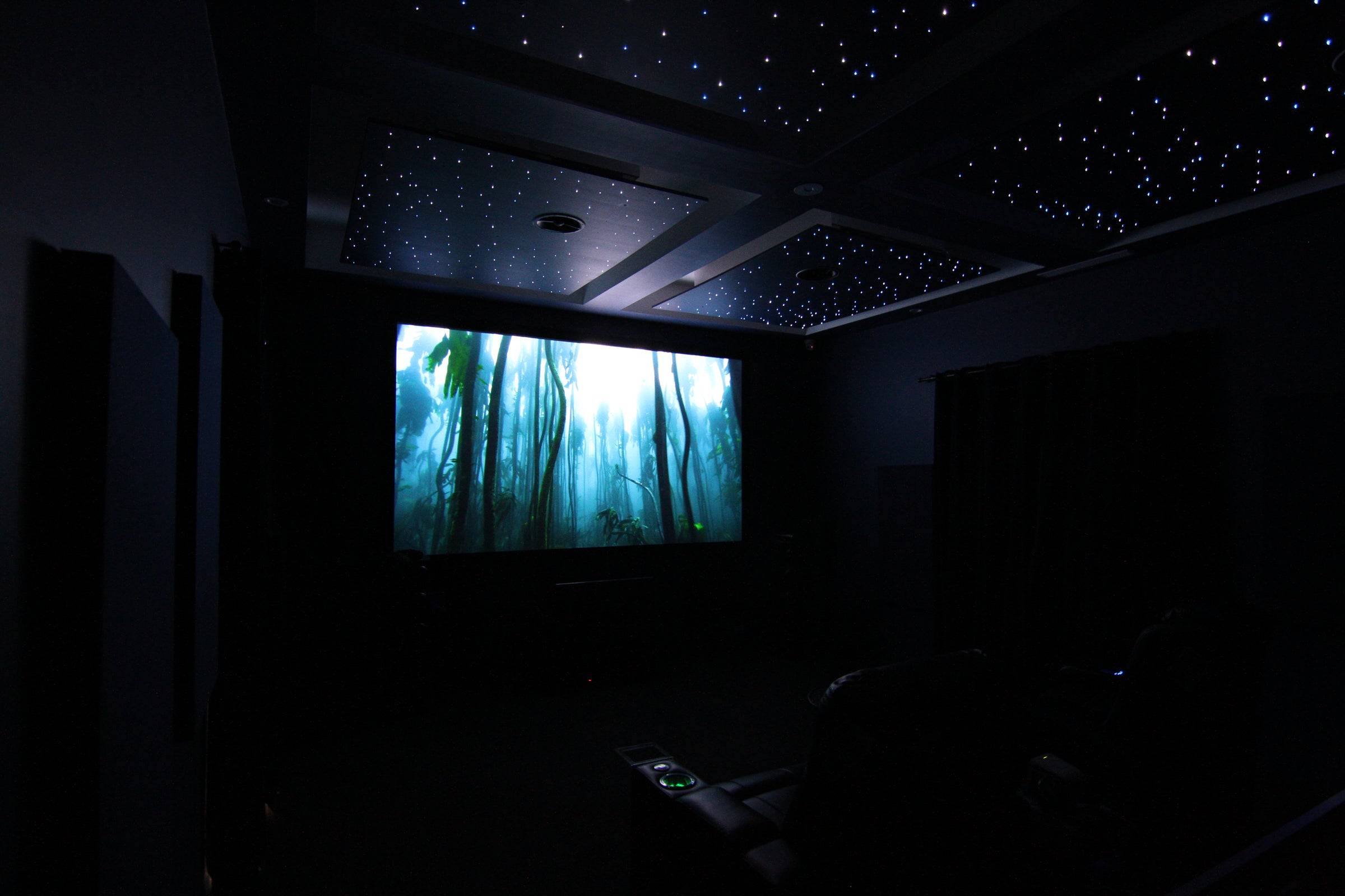 The Bowers & Wilkins in-ceiling speakers in a home theatre from Todds Hi Fi